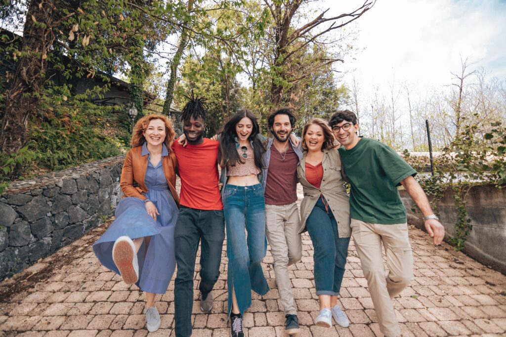 group of happy expats students abroad walking having fun